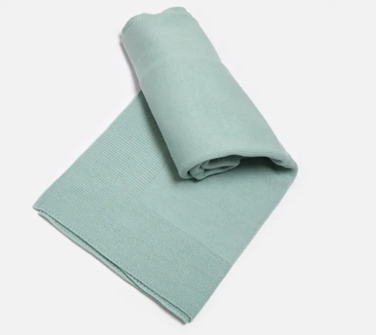 Green knitted blanket