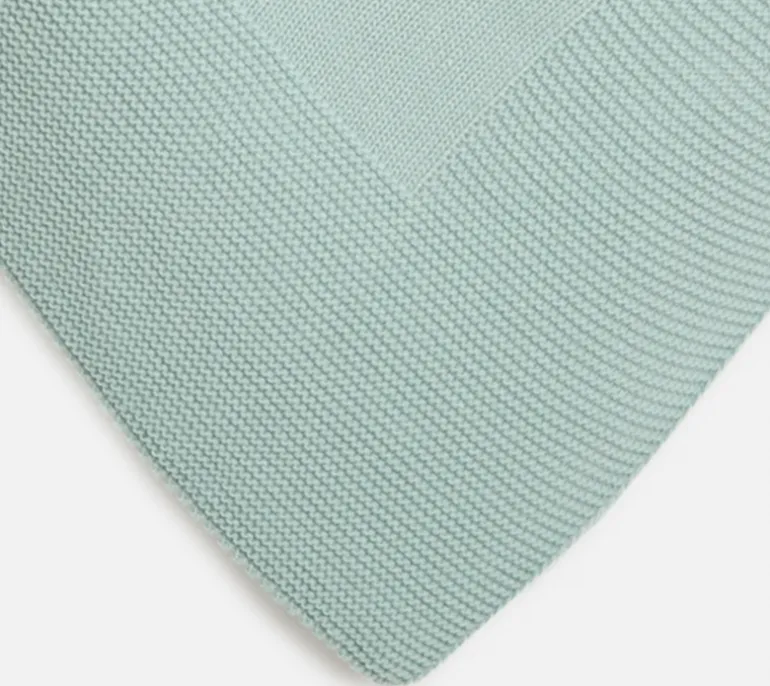 Green knitted blanket